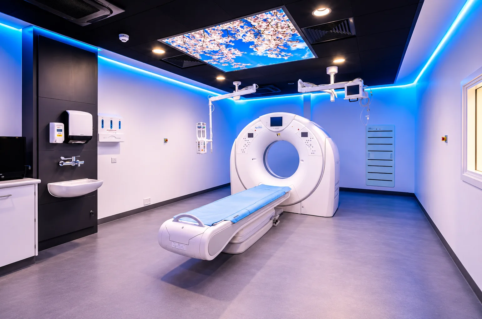 NHS healthcare flooring installation — welded safety vinyl with cap and cove detail in a clinical treatment room